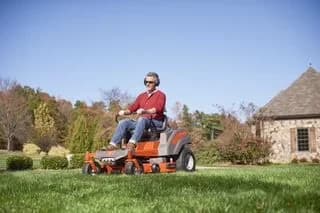 Compact Riding Lawn Mower with Adjustable Speed, LED headlights, 24HP Kawasaki FR730V engine - Model 2C68E4