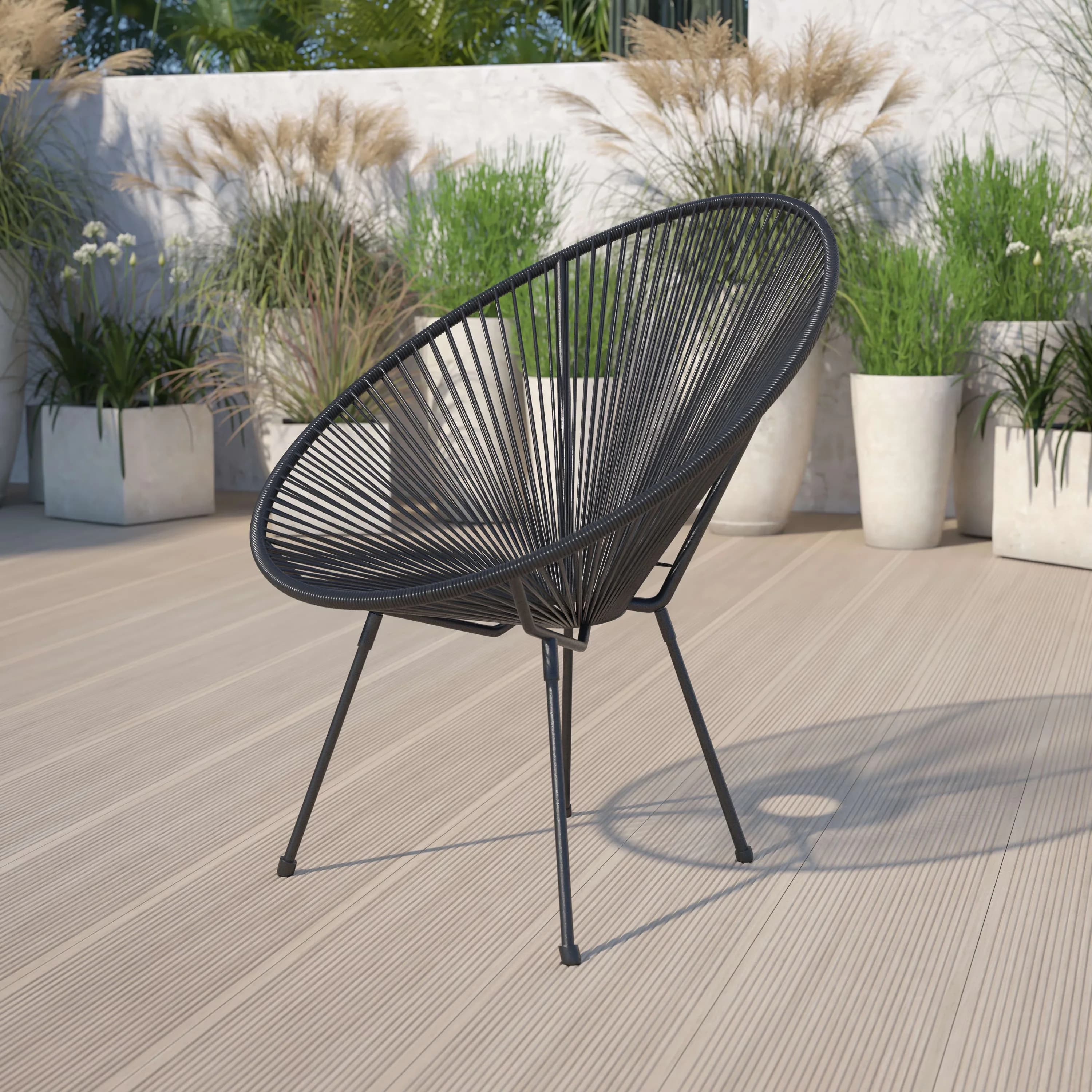 Durable Patio Chair with Contemporary, Stackable, Oval Shape complements many décor styles - Steel, Rattan, Plastic: Polyethylene Black Model E14F97
