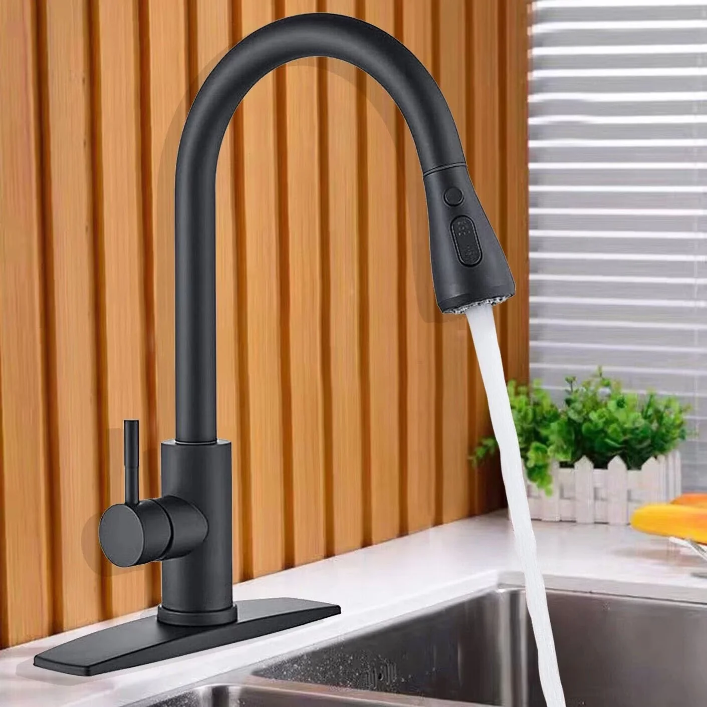 Sleek Plumbing with 360 Degree Rotation, Pull Out Sprayer - Stainless Steel, Ceramic Black Model 540B71